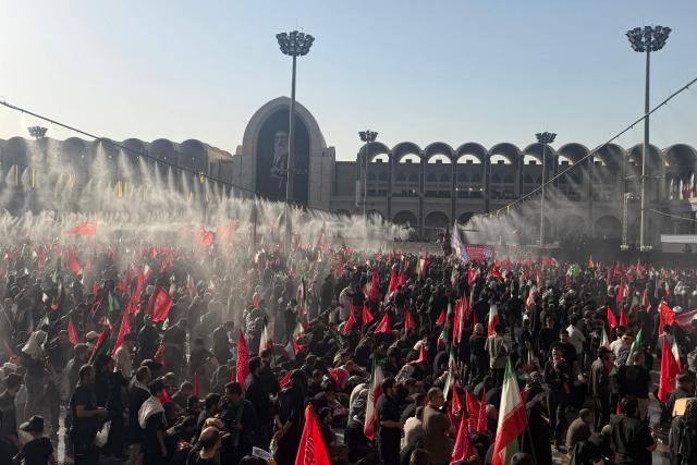 Mourners gather at the Grand Mosalla to pay their final respects to Iran's slain supreme leader Ayatollah Ali Khamenei in Tehran on July 5, 2026. Iran officially began on July 4 morning six days of public funeral ceremonies for late supreme leader Ayatollah Ali Khamenei, state television reported, with processions due to continue in Iraq before his burial. (Photo by Atta KENARE / AFP) / 
