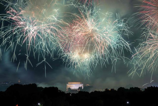 A fireworks display is seen during the "Salute to America" Independence Day celebration on the National Mall in Washington, DC, in the early morning hours of July 5, 2026. The nation is marking the 250th anniversary of the United States Declaration of Indpendence. (Photo by Ken Cedeno / AFP)