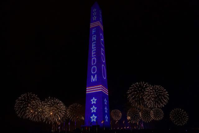 A fireworks display is seen during the "Salute to America" Independence Day celebration on the National Mall in Washington, DC, in the early morning hours of July 5, 2026. The nation is marking the 250th anniversary of the United States Declaration of Indpendence. (Photo by Amid FARAHI / AFP)