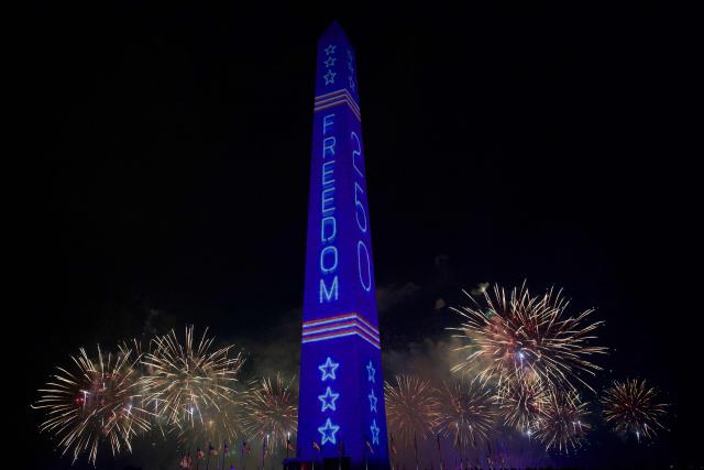 A fireworks display is seen during the "Salute to America" Independence Day celebration on the National Mall in Washington, DC, in the early morning hours of July 5, 2026. The nation is marking the 250th anniversary of the United States Declaration of Indpendence. (Photo by Amid FARAHI / AFP)