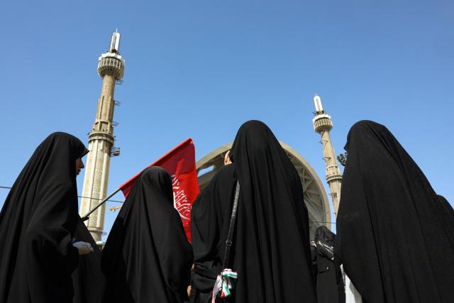Mourners gather to pray for Iran's slain supreme leader Ayatollah Ali Khamenei during the second day of funeral ceremonies at the Grand Mosalla in Tehran on July 5, 2026. Prayers were held July 5 over the casket of Iran's late supreme leader Ali Khamenei, the second day of funeral ceremonies that have drawn huge crowds to pay their final respects in Tehran. Khamenei ruled the Islamic republic from 1989 until he was killed aged 86 in an airstrike on the first day of the US-Israeli war with Iran on February 28. (Photo by AFP) / 