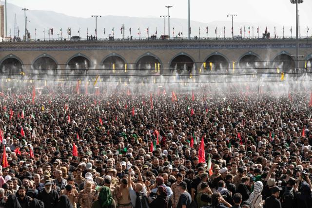 Mourners gather to pray for Iran's slain supreme leader Ayatollah Ali Khamenei during the second day of funeral ceremonies at the Grand Mosalla in Tehran on July 5, 2026. Prayers were held July 5 over the casket of Iran's late supreme leader Ali Khamenei, the second day of funeral ceremonies that have drawn huge crowds to pay their final respects in Tehran. Khamenei ruled the Islamic republic from 1989 until he was killed aged 86 in an airstrike on the first day of the US-Israeli war with Iran on February 28. (Photo by AFP) / 