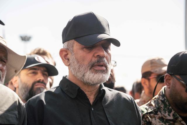 Chief of Iran's Revolutionary Guards, Ahmad Vahidi prays for Iran's slain supreme leader Ayatollah Ali Khamenei during the second day of funeral ceremonies at the Grand Mosalla in Tehran on July 5, 2026. Prayers were held July 5 over the casket of Iran's late supreme leader Ali Khamenei, the second day of funeral ceremonies that have drawn huge crowds to pay their final respects in Tehran. Khamenei ruled the Islamic republic from 1989 until he was killed aged 86 in an airstrike on the first day of the US-Israeli war with Iran on February 28. (Photo by AFP) / 