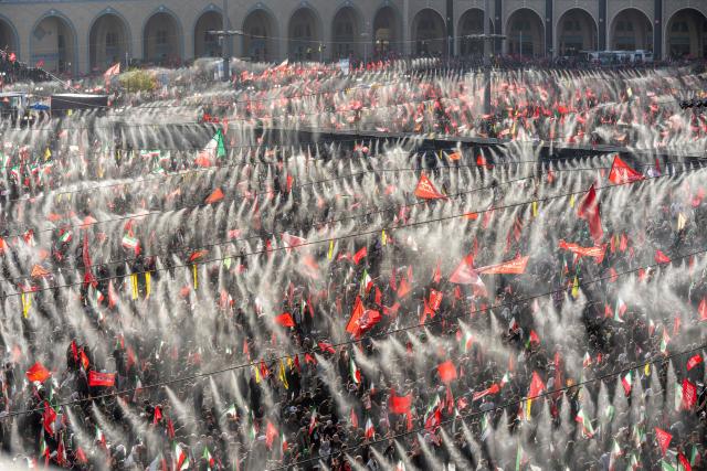 Mourners gather to pray for Iran's slain supreme leader Ayatollah Ali Khamenei during the second day of funeral ceremonies at the Grand Mosalla in Tehran on July 5, 2026. Prayers were held July 5 over the casket of Iran's late supreme leader Ali Khamenei, the second day of funeral ceremonies that have drawn huge crowds to pay their final respects in Tehran. Khamenei ruled the Islamic republic from 1989 until he was killed aged 86 in an airstrike on the first day of the US-Israeli war with Iran on February 28. (Photo by AFP) / 