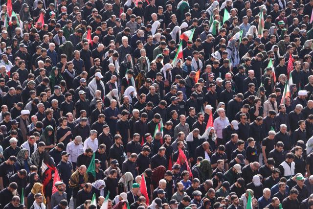 Mourners gather at the Grand Mosalla to pray for Iran's slain supreme leader Ayatollah Ali Khamenei during the second day of funeral ceremonies in Tehran on July 5, 2026. Prayers were held July 5 over the casket of Iran's late supreme leader Ali Khamenei, the second day of funeral ceremonies that have drawn huge crowds to pay their final respects in Tehran. Khamenei ruled the Islamic republic from 1989 until he was killed aged 86 in an airstrike on the first day of the US-Israeli war with Iran on February 28. (Photo by ATTA KENARE / AFP) / 