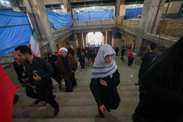 Mourners leave after gathering to pray for Iran's slain supreme leader Ayatollah Ali Khamenei during the second day of funeral ceremonies at the Grand Mosalla in Tehran on July 5, 2026. Prayers were held July 5 over the casket of Iran's late supreme leader Ali Khamenei, the second day of funeral ceremonies that have drawn huge crowds to pay their final respects in Tehran. Khamenei ruled the Islamic republic from 1989 until he was killed aged 86 in an airstrike on the first day of the US-Israeli war with Iran on February 28. (Photo by ATTA KENARE / AFP) / 