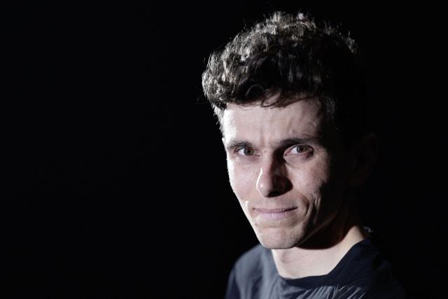 (FILES) Latest winner of the Ultra Trail du Mont Blanc 2024 as an amateur athlete, now elite runner for the brand Hoka, Vincent Bouillard poses during a photo session in Paris, on April 2, 2025. Revealed by his success at the UTMB in 2024, Vincent Bouillard became, on 28 June 2026, the first French trail runner to win the Western States 100, another benchmark ultra-race in California, though he insists that "the competitive spirit" does not come naturally to him. (Photo by STEPHANE DE SAKUTIN / AFP)