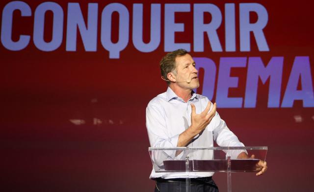 President of the Belgian French-speaking left-wing Socialist Party (PS) Paul Magnette gestures as he delivers a speech on stage during the Belgian French-speaking Socialist Party congress in Namur, on July 5, 2026. (Photo by VIRGINIE LEFOUR / Belga / AFP) / Belgium OUT