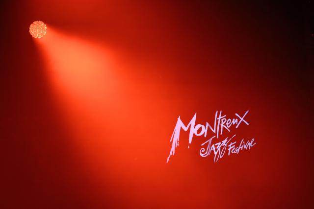 This photograph shows the logo of the Montreux Jazz Festival during a concert on July 4, 2026. (Photo by Fabrice COFFRINI / AFP)