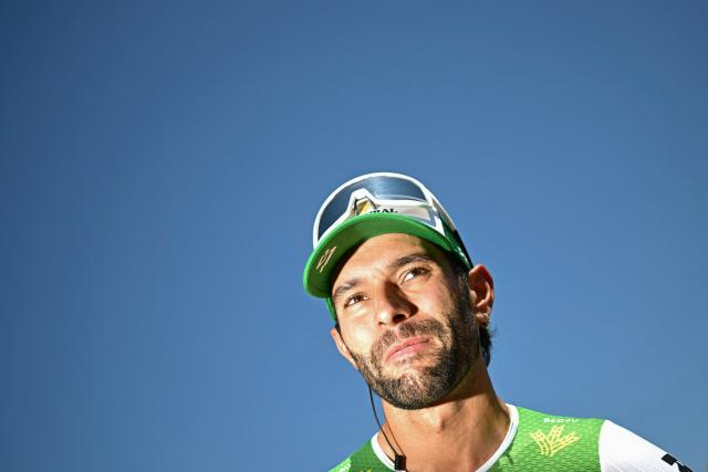 Caja Rural - Seguros RGA team's Colombian rider Fernando Gaviria awaits the start of the 2nd stage of the 113th edition of the Tour de France cycling race, 168,5 km between Tarragona and Barcelona in northeastern Spain, on July 5, 2026. (Photo by Loic VENANCE / AFP)