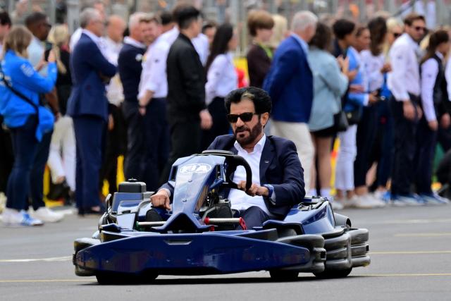 FIA President Mohammed Ben Sulayem drives a Lego minicar during the drivers parade ahead of the Formula One British Grand Prix at the Silverstone motor racing circuit in Silverstone, central England, on July 5, 2026. (Photo by Andrej ISAKOVIC / AFP)