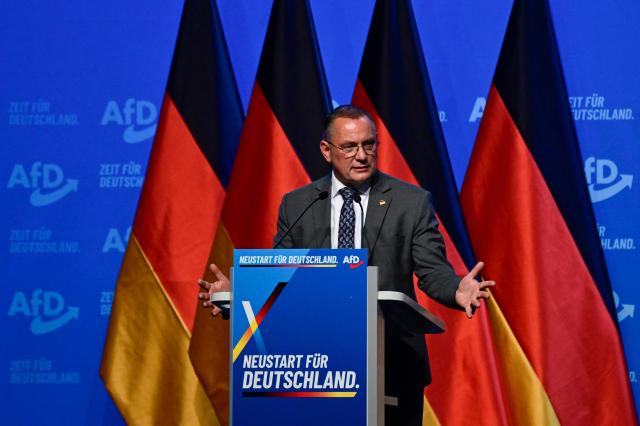 AfD co-leader Tino Chrupalla addresses delegates at the end of the party congress of far-right Alternative for Germany (AfD) at the Messe Erfurt fairground in Erfurt, eastern Germany on July 5, 2026.  (Photo by John MACDOUGALL / AFP)