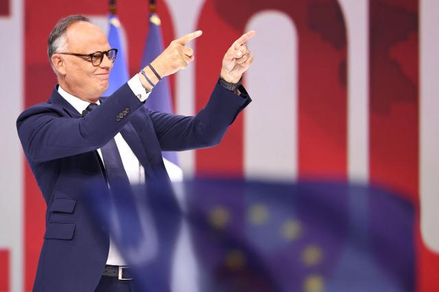 French right-wing party Horizons founder and president, mayor of Le Havre and candidate for the 2027 French presidential election Edouard Philippe gestures as he arrives on stage to deliver a speech during his presidential election campaign rally at the Adidas Arena, in northern Paris on July 5, 2026. (Photo by SIMON WOHLFAHRT / AFP)