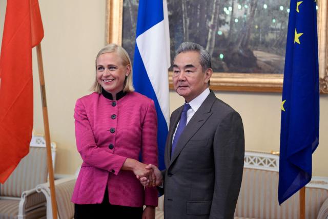 Finnish Foreign Minister Elina Valtonen (L) welcomes Chinese Foreign Minister Wang Yi as they meet in Helsinki, Finland, on July 5, 2026. Chinese Foreign Minister Wang Yi is currently touring the Nordic countries. (Photo by Jade Silpo / Lehtikuva / AFP) / Finland OUT