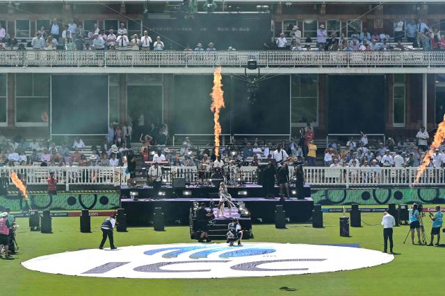 British singer Rita Ora (C) performs before the start of the ICC Women's T20 cricket world cup 2026 final between Australia and England, at Lord's in London on July 5, 2026. (Photo by JUSTIN TALLIS / AFP)