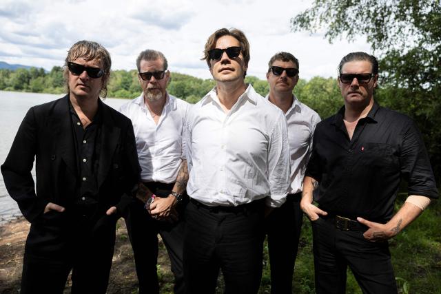 (From L) Bassist The Johan and Only, guitarist Vigilante Carlstroem, singer Howlin’ Pelle Almqvist, guitarist Niklas Almqvist and drummer Chris Dangerous of Swedish garage punk band The Hives pose for a photograph on the last day of the 36th edition of the Eurockeennes de Belfort music festival, in Sermamagny, eastern France on July 5, 2026.  (Photo by ROMEO BOETZLE / AFP)