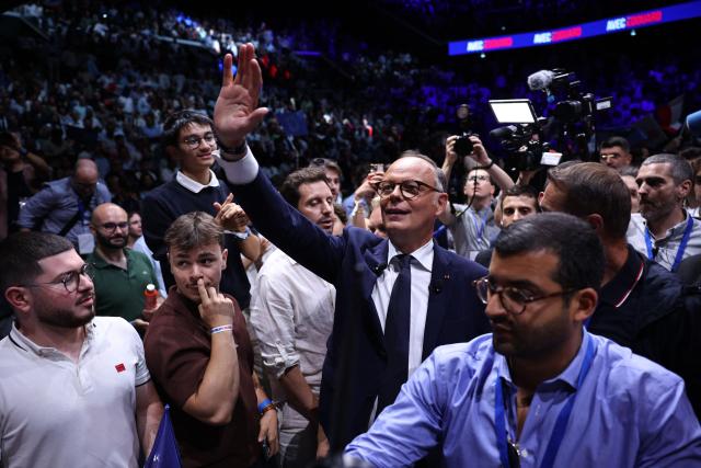 French right-wing party Horizons founder and president, mayor of Le Havre and candidate for the 2027 French presidential election Edouard Philippe (C) gestures at the end of his presidential election campaign rally at the Adidas Arena, in northern Paris on July 5, 2026. (Photo by SIMON WOHLFAHRT / AFP)