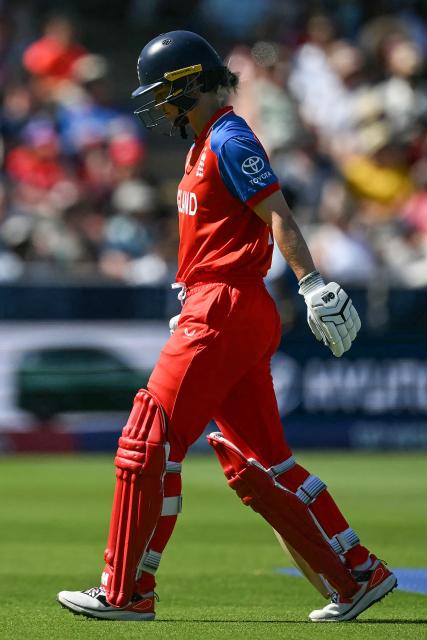 England's Amy Jones walks off after being dismissed during the ICC Women's T20 cricket world cup 2026 final between Australia and England, at Lord's in London on July 5, 2026. (Photo by JUSTIN TALLIS / AFP)