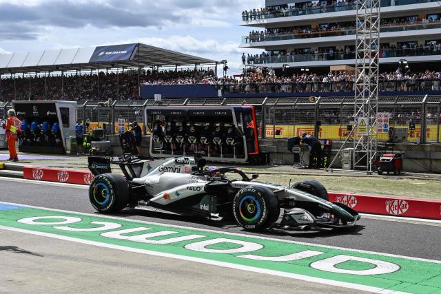 McLaren's Australian driver Oscar Piastri drives into pit lane during the Formula One British Grand Prix at the Silverstone motor racing circuit in Silverstone, central England, on July 5, 2026. (Photo by PETER POWELL / POOL / AFP)