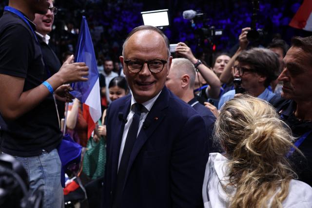 French right-wing party Horizons founder and president, mayor of Le Havre and candidate for the 2027 French presidential election Edouard Philippe (C) reacts at the end of his presidential election campaign rally at the Adidas Arena, in northern Paris on July 5, 2026. (Photo by SIMON WOHLFAHRT / AFP)