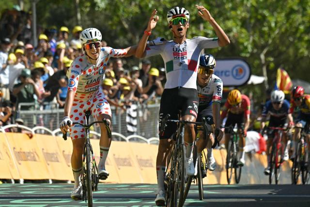 UAE Team Emirates - XRG's Mexican rider Isaac Del Toro cycles to the finish line to win the 2nd stage ahead of UAE Team Emirates - XRG's Slovenian rider Tadej Pogacar (L) during the 113th edition of the Tour de France cycling race, 168,5 km between Tarragona and Barcelona in northeastern Spain, on July 5, 2026. (Photo by Loic VENANCE / AFP)