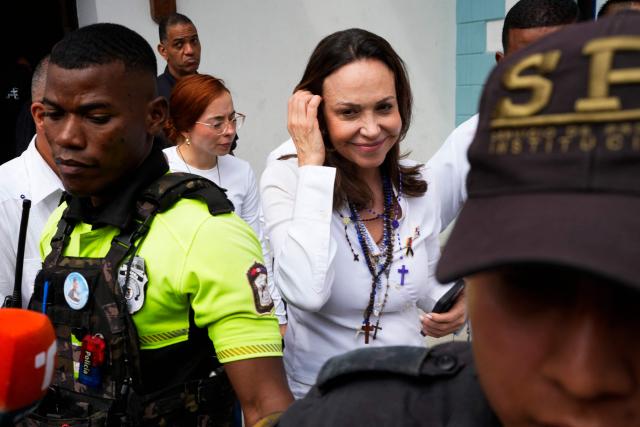 Venezuelan opposition leader Maria Corina Machado smiles as she leaves after a mass at the National Basilica Santa Maria la Antigua in Panama City on July 5, 2026. (Photo by ARNULFO FRANCO / AFP)