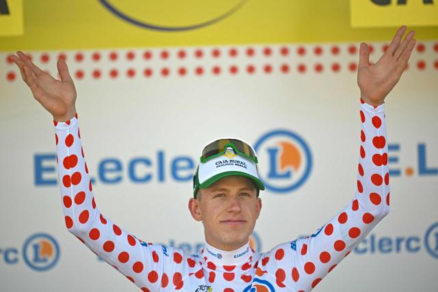 Caja Rural - Seguros RGA team's Dutch rider Alex Molenaar celebrates on the podium with the best climber's polka dot (dotted) jersey after the 2nd stage of the 113th edition of the Tour de France cycling race, 168,5 km between Tarragona and Barcelona in northeastern Spain, on July 5, 2026. (Photo by Loic VENANCE / AFP)