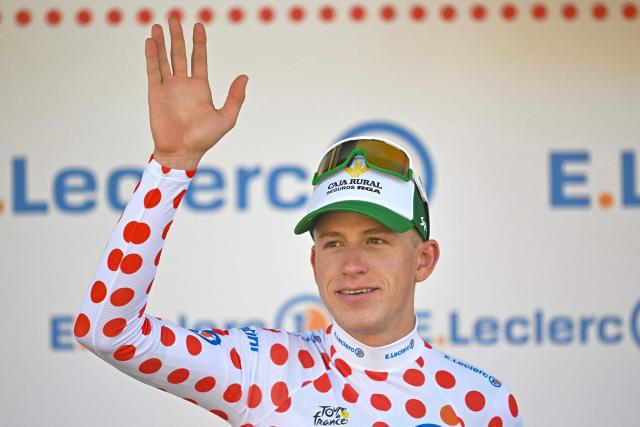 Caja Rural - Seguros RGA team's Dutch rider Alex Molenaar celebrates on the podium with the best climber's polka dot (dotted) jersey after the 2nd stage of the 113th edition of the Tour de France cycling race, 168,5 km between Tarragona and Barcelona in northeastern Spain, on July 5, 2026. (Photo by Loic VENANCE / AFP)