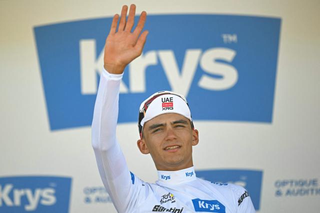 UAE Team Emirates - XRG's Mexican rider Isaac Del Toro celebrates on the podium with the best young rider's white jersey after the 2nd stage of the 113th edition of the Tour de France cycling race, 168,5 km between Tarragona and Barcelona in northeastern Spain, on July 5, 2026. (Photo by Loic VENANCE / AFP)