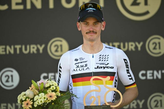 Team Jayco AlUla's German rider Felix Engelhardt celebrates on the podium with the most combative rider's award after the 2nd stage of the 113th edition of the Tour de France cycling race, 168,5 km between Tarragona and Barcelona in northeastern Spain, on July 5, 2026. (Photo by Loic VENANCE / AFP)
