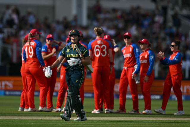 Australia's Georgia Voll reacts as she walks back to the pavilion having lost her wicket for 9 runs during the ICC Women's T20 cricket world cup 2026 final between Australia and England, at Lord's in London on July 5, 2026. (Photo by JUSTIN TALLIS / AFP)
