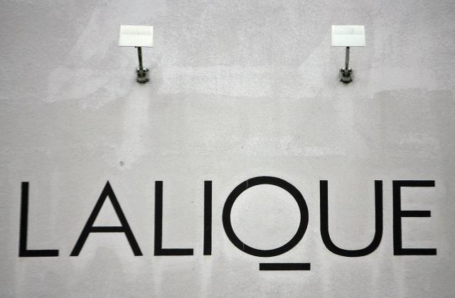 (FILES) This photograph shows the logo of French luxury crystal manufacturer Lalique displayed on the facade of the group's factory in Wingen-sur-Moder, eastern France on December 5, 2007. The Lalique Glass Museum in Alsace announced on July 5, 2026, that it had been burgled, with the thief or thieves making off with jewellery worth "several million" euros, according to a source close to the investigation. (Photo by Olivier MORIN / AFP)