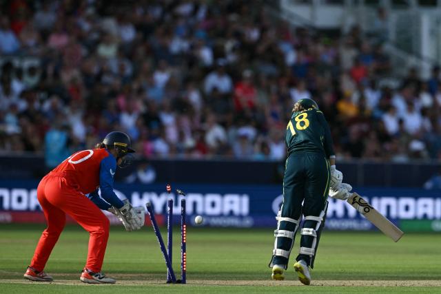 Australia's Phoebe Litchfield is bowled by England's Charlie Dean during the ICC Women's T20 cricket world cup 2026 final between Australia and England, at Lord's in London on July 5, 2026. (Photo by JUSTIN TALLIS / AFP)
