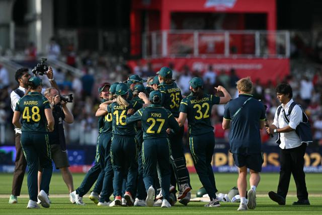 Australia's players celebrate beating England in the ICC Women's T20 cricket world cup 2026 final between Australia and England, at Lord's in London on July 5, 2026. Australia thrashed England by seven wickets to win the Women's T20 World Cup final at Lord's on Sunday. Victory gave Australia a record-extending seventh Women's T20 global title as they chased down a target of 151 with 17 balls to spare. (Photo by JUSTIN TALLIS / AFP)