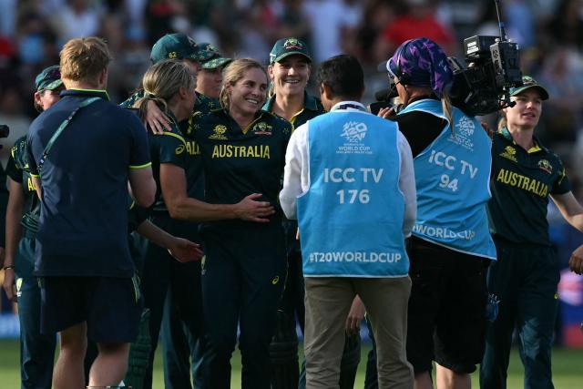 Australia's players celebrate beating England in the ICC Women's T20 cricket world cup 2026 final between Australia and England, at Lord's in London on July 5, 2026. Australia thrashed England by seven wickets to win the Women's T20 World Cup final at Lord's on Sunday. Victory gave Australia a record-extending seventh Women's T20 global title as they chased down a target of 151 with 17 balls to spare. (Photo by JUSTIN TALLIS / AFP)