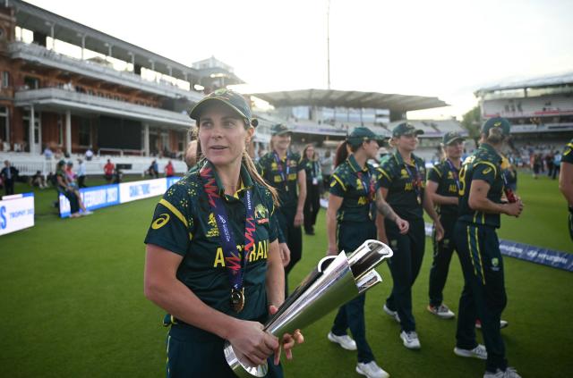 Australia's captain Sophie Molineux holds the trophy as Australia take a lap of honour after the ICC Women's T20 cricket world cup 2026 final between Australia and England, at Lord's in London on July 5, 2026. Australia thrashed England by seven wickets to win the Women's T20 World Cup final at Lord's on Sunday. Victory gave Australia a record-extending seventh Women's T20 global title as they chased down a target of 151 with 17 balls to spare. (Photo by JUSTIN TALLIS / AFP)