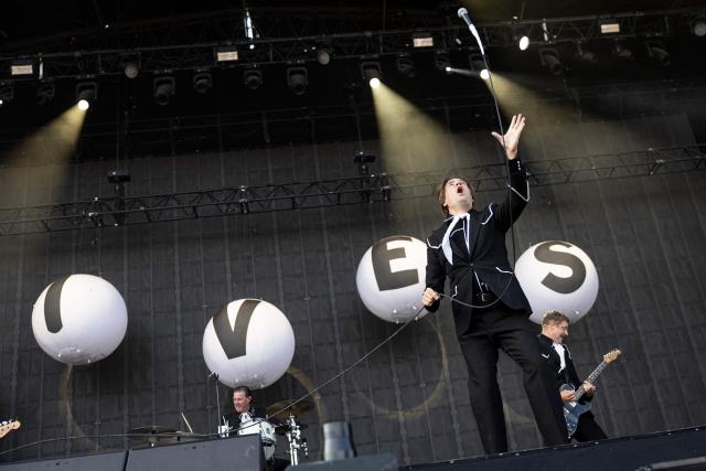 Howlin' Pelle Almqvist, lead singer of Swedish garage punk band The Hives, performs on stage on the last day of the 36th edition of the Eurockeennes de Belfort music festival in Sermamagny, eastern France on July 5, 2026. (Photo by ROMEO BOETZLE / AFP)