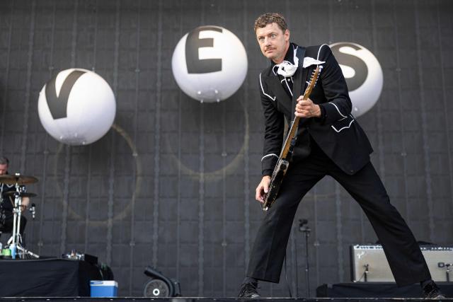 Niklas Almqvist, guitarist of Swedish garage punk band The Hives, performs on stage on the last day of the 36th edition of the Eurockeennes de Belfort music festival in Sermamagny, eastern France on July 5, 2026. (Photo by ROMEO BOETZLE / AFP)