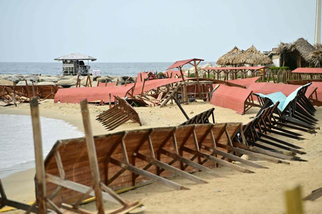 View destroyed infrastrucre at the beach of Caraballeda, La Guaira state, Venezuela, on July 5, 2026, following the June 24 twin earthquakes. The devastating earthquakes that struck Venezuela eleven days ago have now claimed nearly 3,000 lives, according to the latest figures released on July 4, 2026, as foreign rescue teams wind down their operations to find survivors. (Photo by MARTIN BERNETTI / AFP)