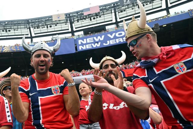 Norwegian fans wear horned helmets cheering for their team ahead of the 2026 World Cup round of 16 football match between Brazil and Norway at the New York/New Jersey Stadium in East Rutherford on July 5, 2026.  (Photo by Jewel SAMAD / AFP)