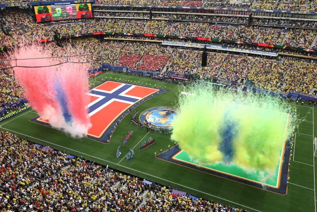 Fireworks with Norway and Brazil colors explode after the anthems ceremony ahead of the 2026 World Cup round of 16 football match between Brazil and Norway at the New York/New Jersey Stadium in East Rutherford on July 5, 2026.  (Photo by CHARLY TRIBALLEAU / AFP)