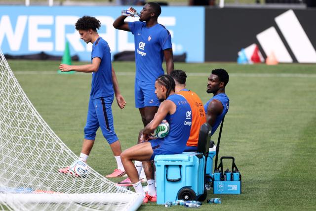 France's forward #25 Maghnes Akliouche, France's defender #15 Ibrahima Konate, and France's forward #09 Marcus Thuram take part a training session at Bentley University in Waltham, near Boston, on July 5, 2026, during the 2026 World Cup football tournament. (Photo by FRANCK FIFE / AFP)
