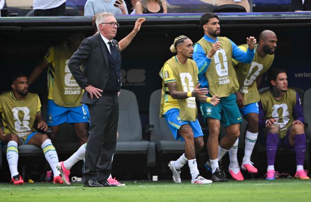 (From L) Brazil's defender #14 Bremer, Brazil's Italian head coach Carlo Ancelotti, Brazil's forward #11 Raphinha, Brazil's midfielder #20 Lucas Paqueta, Brazil's forward #25 Igor Thiago and Brazil's goalkeeper #23 Ederson react during the 2026 World Cup round of 16 football match between Brazil and Norway at the New York/New Jersey Stadium in East Rutherford on July 5, 2026.  (Photo by Pedro UGARTE / AFP)
