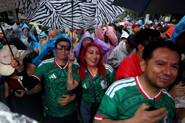 Mexican football fans gather at the Angel of Independence to watch the 2026 FIFA World Cup Round of 16 football match between Mexico and England, in Mexico City on July 5, 2026. (Photo by Claudia Rosel / AFP)
