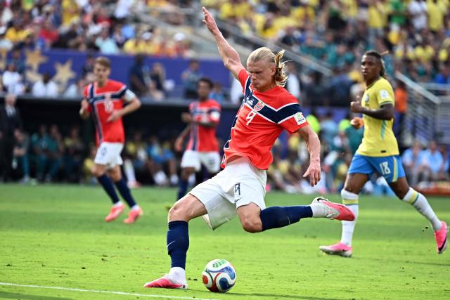Norway's forward #09 Erling Braut Haaland kicks the ball and scores his team's second goal during the 2026 World Cup round of 16 football match between Brazil and Norway at the New York/New Jersey Stadium in East Rutherford on July 5, 2026.  (Photo by Jewel SAMAD / AFP)