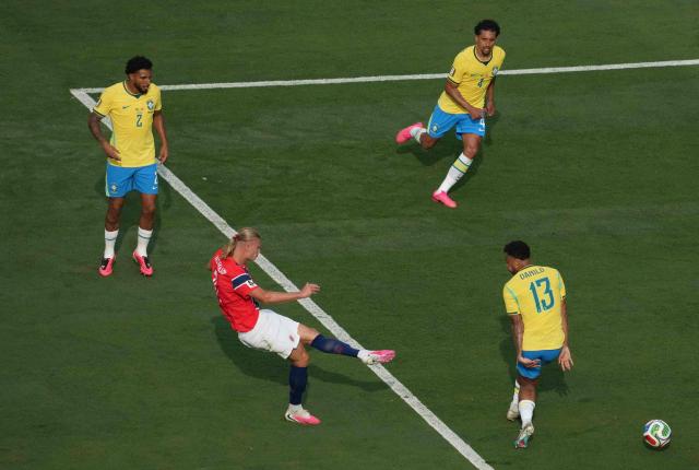 Norway's forward #09 Erling Braut Haaland shoots and scores his team's second goal during the 2026 World Cup round of 16 football match between Brazil and Norway at the New York/New Jersey Stadium in East Rutherford on July 5, 2026.  (Photo by TIMOTHY A. CLARY / AFP)