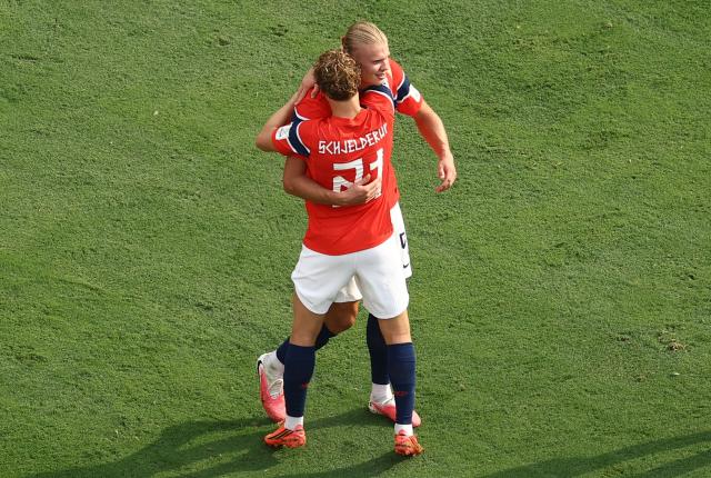 Norway's forward #09 Erling Braut Haaland celebrates with teammate Norway's midfielder #21 Andreas Schjelderup scoring his team's second goal during the 2026 World Cup round of 16 football match between Brazil and Norway at the New York/New Jersey Stadium in East Rutherford on July 5, 2026.  (Photo by CHARLY TRIBALLEAU / AFP)