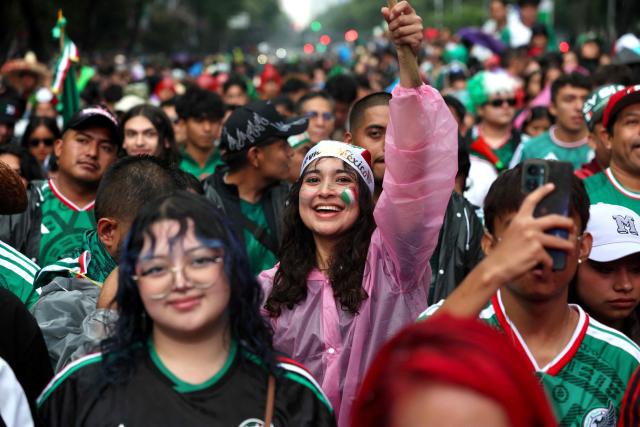 Mexican football fans gather at the Angel of Independence to watch the 2026 FIFA World Cup Round of 16 football match between Mexico and England, in Mexico City on July 5, 2026. (Photo by Claudia Rosel / AFP)