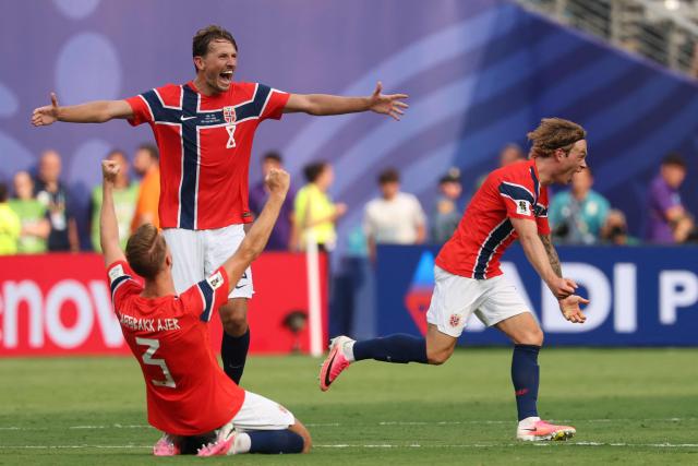 Norway's defender #03 Kristoffer Vassbakk Ajer, midfielder #08 Sander Berge, and midfielder #06 Patrick Berg react after winning the 2026 World Cup round of 16 football match between Brazil and Norway at the New York/New Jersey Stadium in East Rutherford on July 5, 2026.  (Photo by Odd ANDERSEN / AFP)
