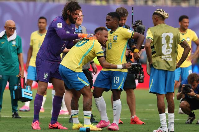 Brazil's forward #10 Neymar (C), goalkeeper #01 Alisson (L), and forward #19 Endrick (R) react after losing the 2026 World Cup round of 16 football match between Brazil and Norway at the New York/New Jersey Stadium in East Rutherford on July 5, 2026.  (Photo by Odd ANDERSEN / AFP)